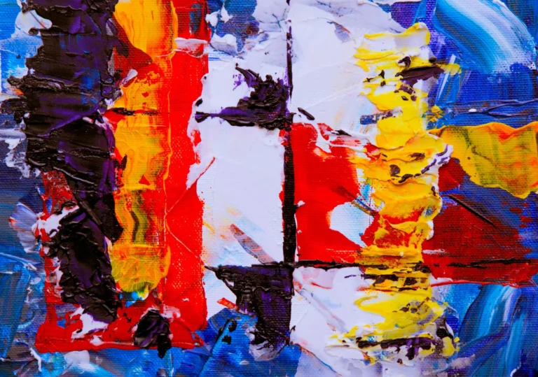 Dynamic abstract painting featuring vibrant colors and bold brushstrokes.