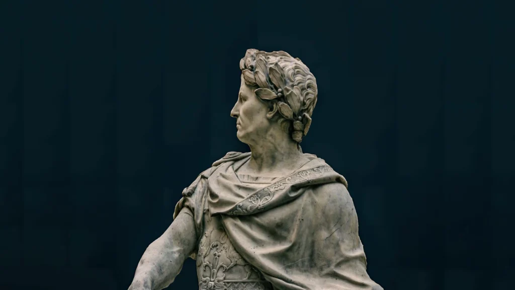 Close-up of a marble statue depicting a classical historical figure with intricate details.