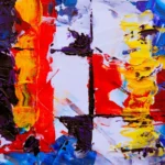 Dynamic abstract painting featuring vibrant colors and bold brushstrokes.
